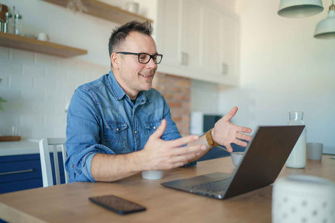 Virtual Solution Center Visit us virtually - man at laptop